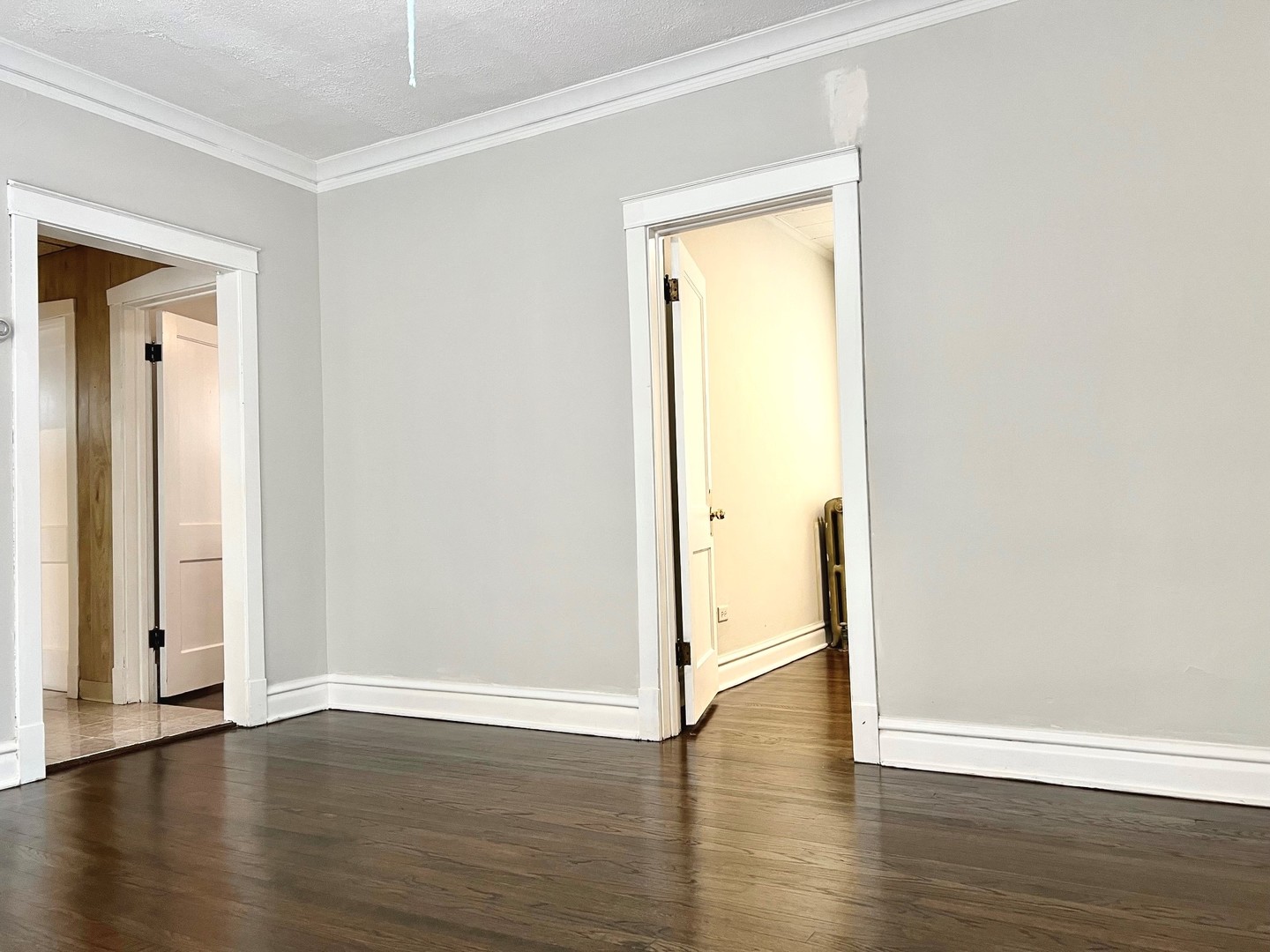 1940 Ridgeland Avenue Berwyn, IL 60402 - Photo 17 of 24 a view of an empty room with wooden floor