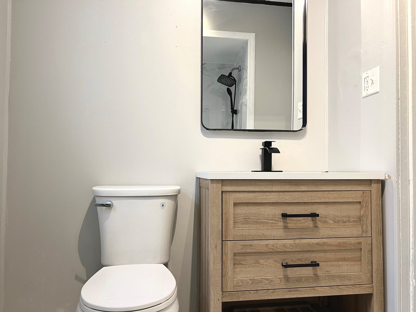 1940 Ridgeland Avenue Berwyn, IL 60402 - Photo 18 of 24 a bathroom with a toilet sink and mirror