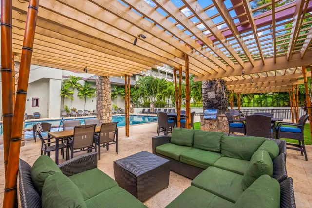 a view of a swimming pool with a patio