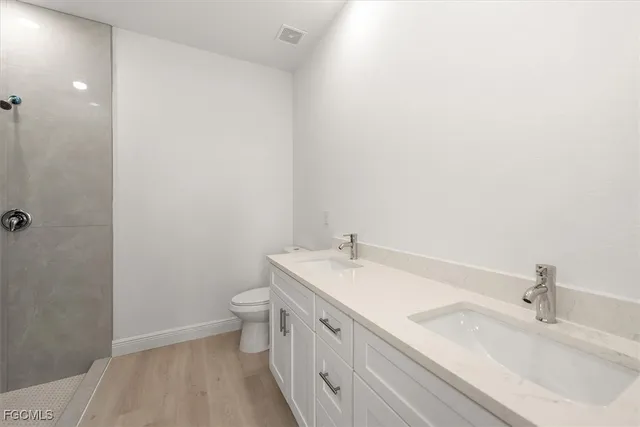 a bathroom with a sink and a toilet