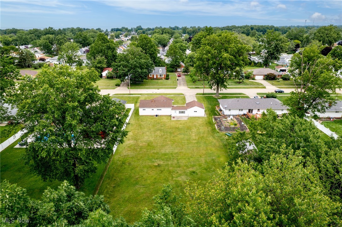 29776 Arthur Road Wickliffe, OH 44092 - Photo 41 of 49 Aerial view of residential area with a tree filled landscape