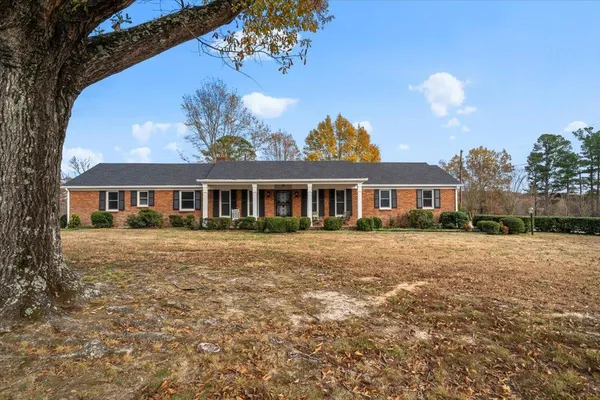 a front view of house with yard