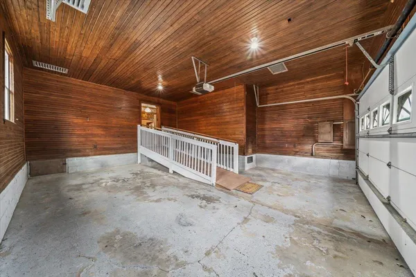 a view of empty room with floor to ceiling window