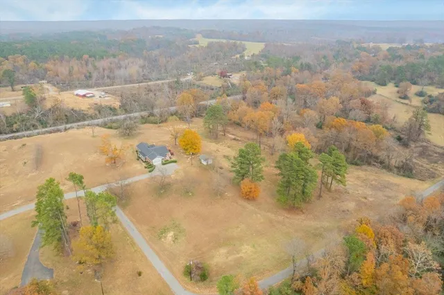 a view of a swimming pool with an outdoor space