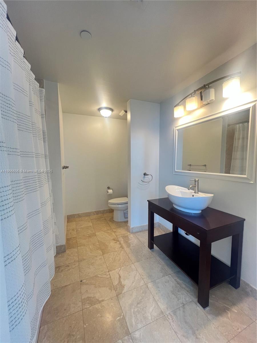 350 South Miami Avenue, Unit 1905 Miami, FL 33130 - Photo 11 of 27 a room with pool table and windows