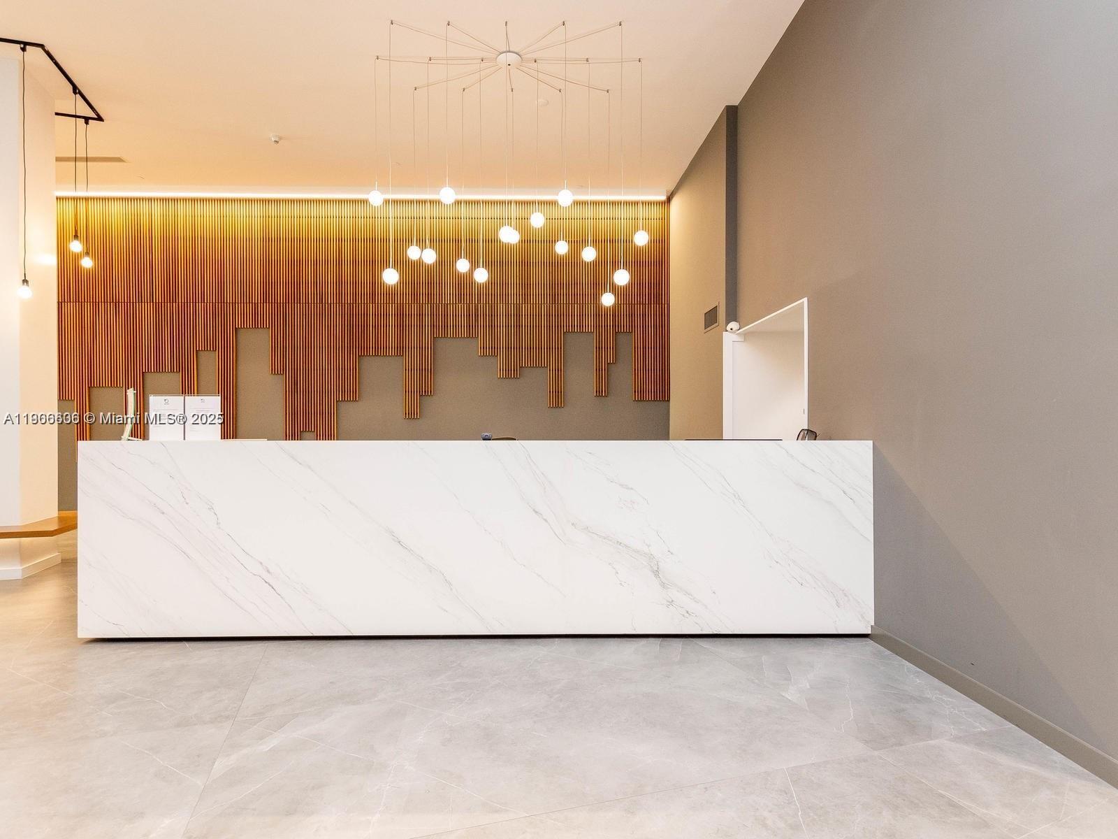 350 South Miami Avenue, Unit 1905 Miami, FL 33130 - Photo 18 of 27 a white bath tub sitting in a bathroom