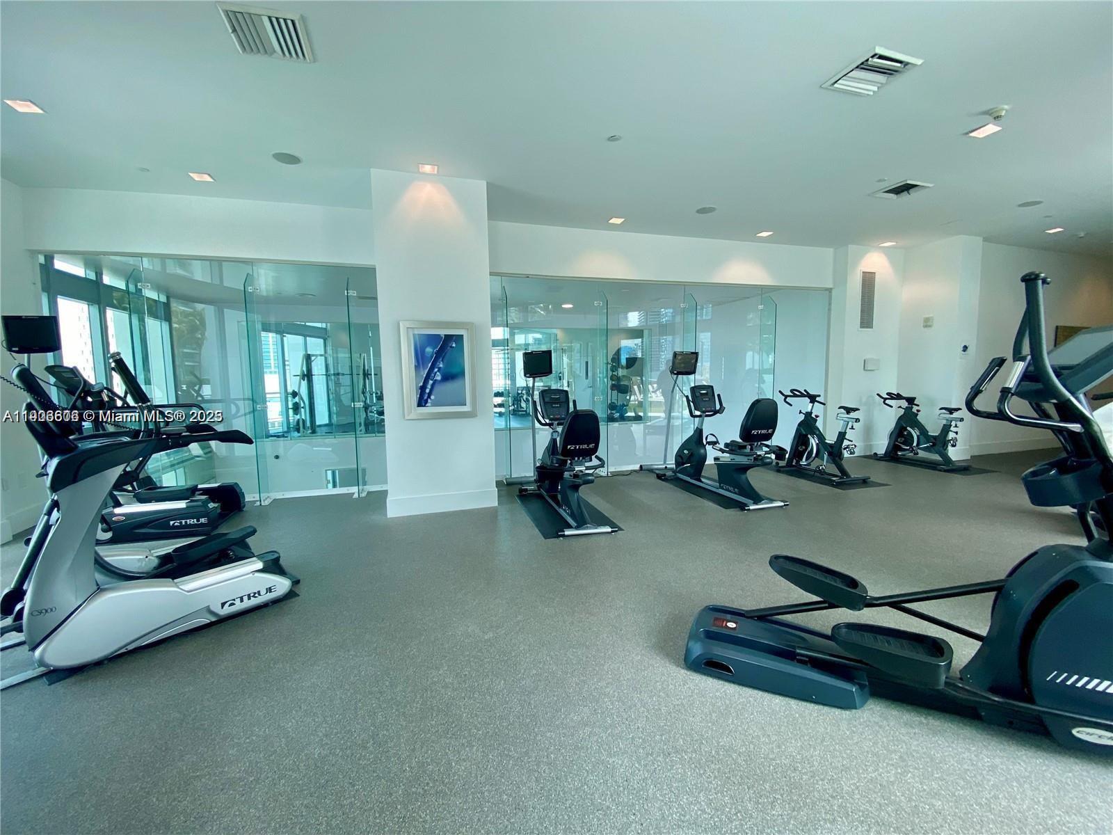 350 South Miami Avenue, Unit 1905 Miami, FL 33130 - Photo 21 of 27 a room with gym equipment and gym equipment
