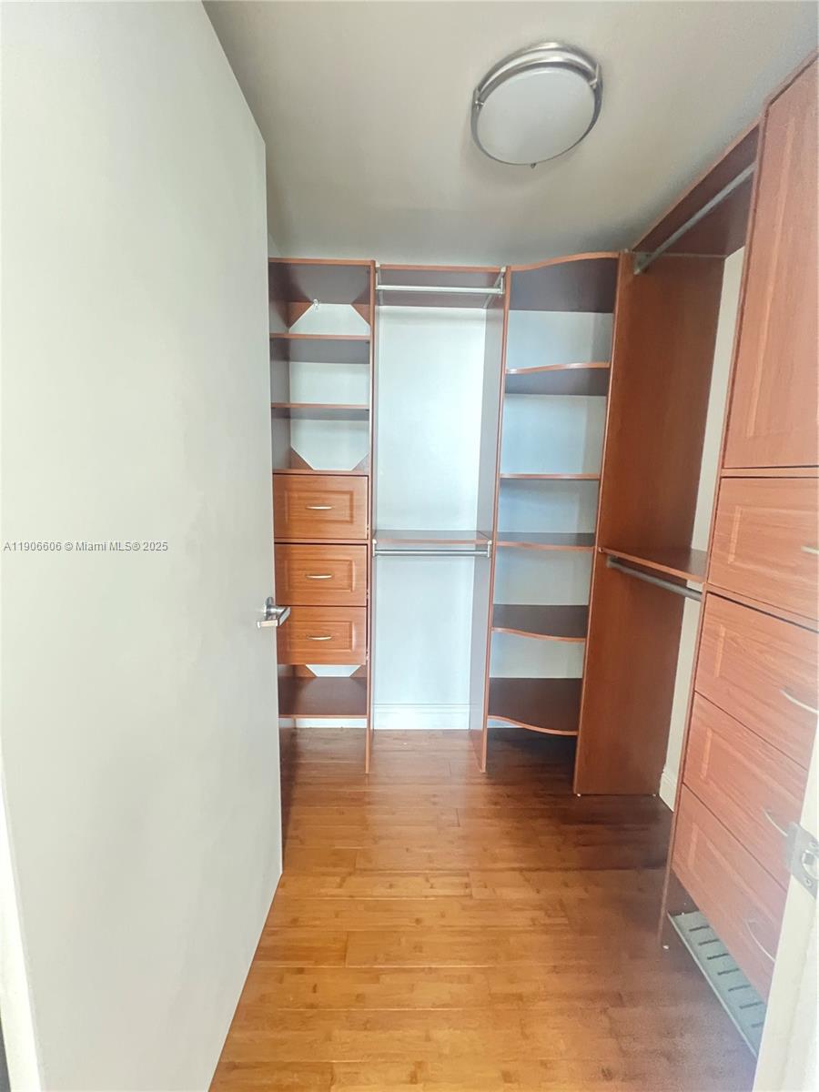 350 South Miami Avenue, Unit 1905 Miami, FL 33130 - Photo 9 of 27 a view of a room with wooden floor and window