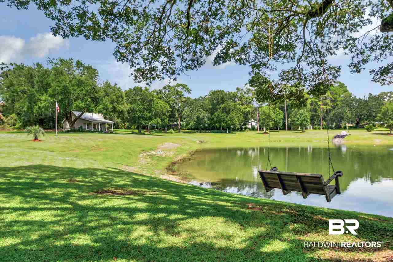11000 Kelly Road Mobile, AL 36608 - Photo 3 of 48 3 +/- acre pond with fountain and stocked with bas