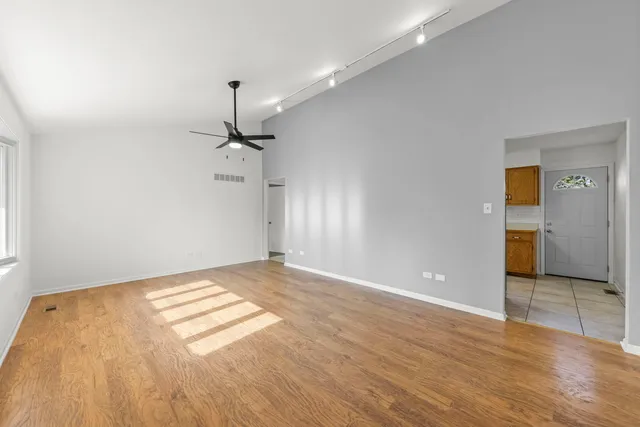 a view of an empty room and window