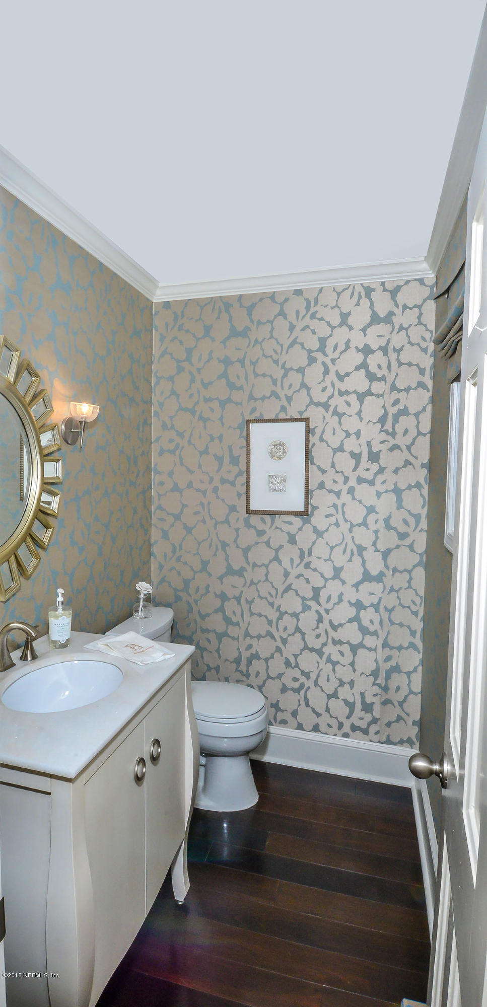 302 Pablo Road Ponte Vedra Beach, FL 32082 - Photo 15 of 28 a bathroom with a sink and a mirror