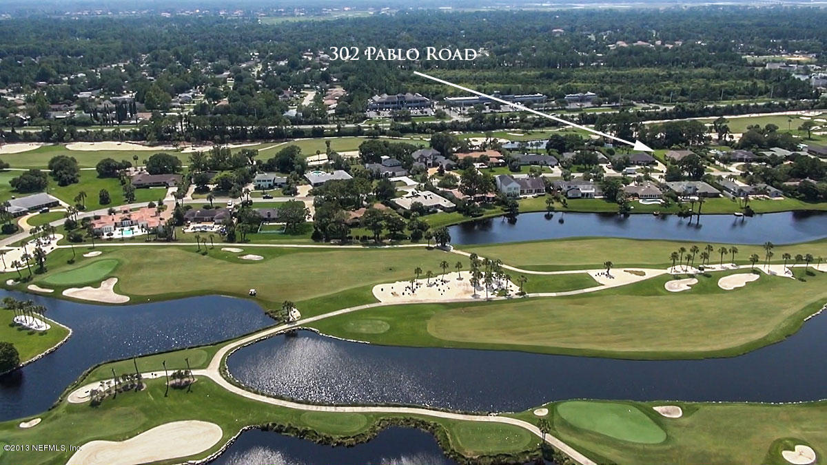 302 Pablo Road Ponte Vedra Beach, FL 32082 - Photo 2 of 28 an aerial view of a swimming pool
