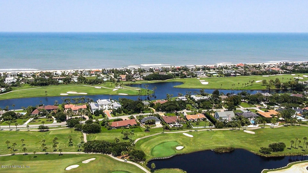 302 Pablo Road Ponte Vedra Beach, FL 32082 - Photo 5 of 28 a view of a lake with a city