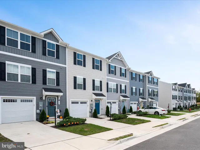 a front view of a building with street view