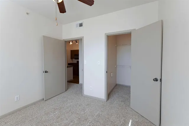 a kitchen with a sink stove and microwave