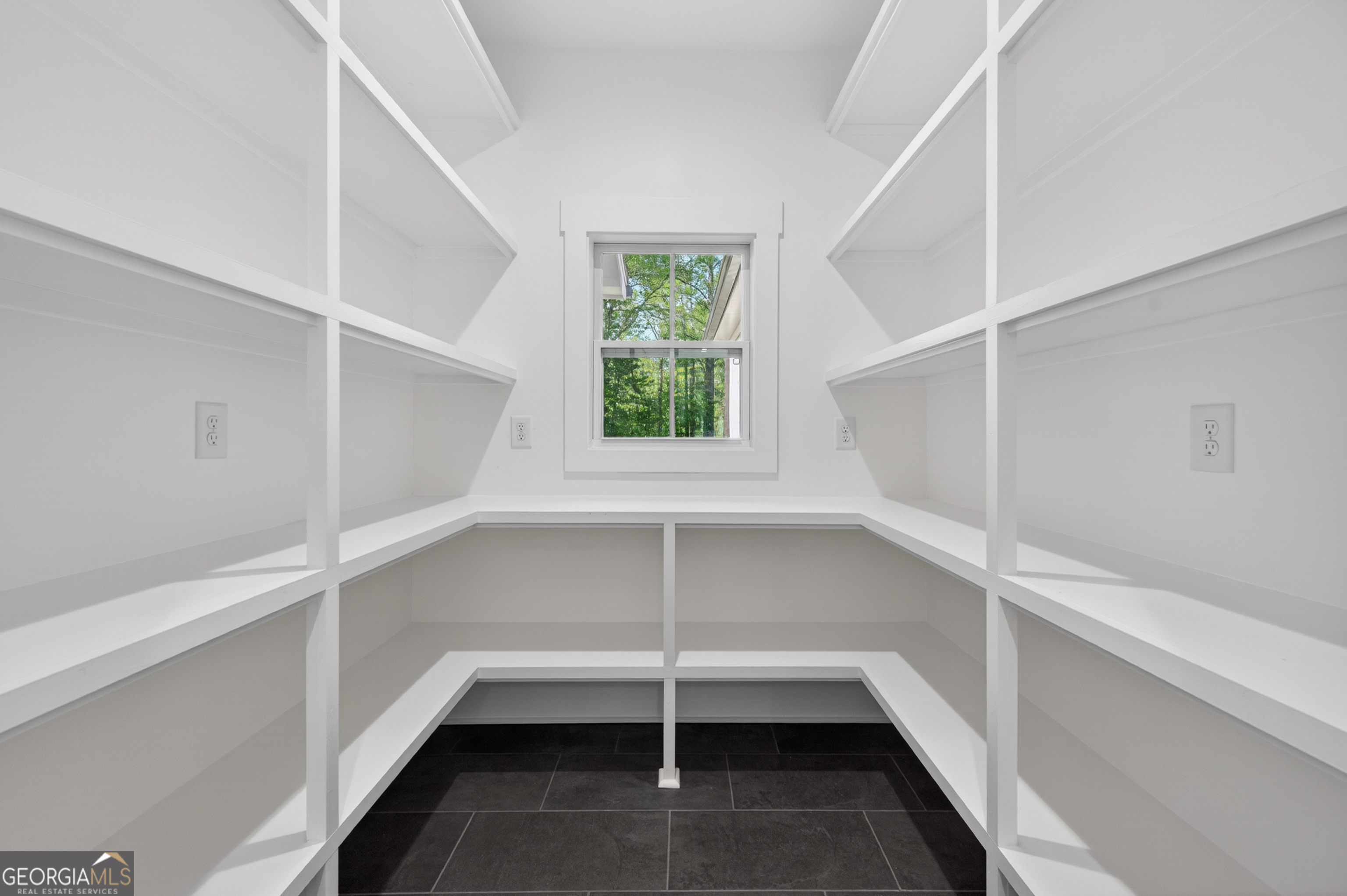 1455 Laney Drive Locust Grove, GA 30248 - Photo 22 of 37 a view of an empty walk in closet