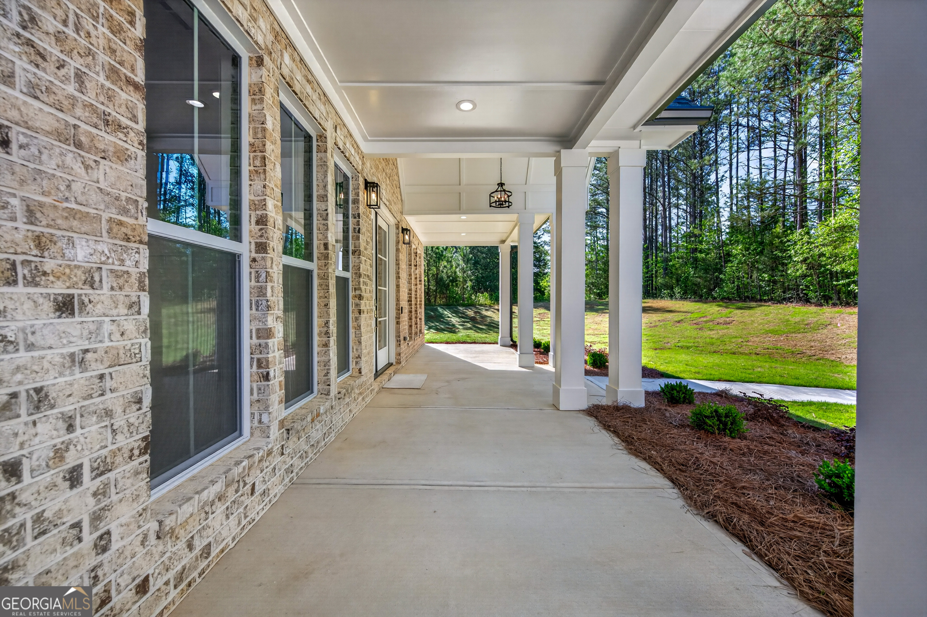 1455 Laney Drive Locust Grove, GA 30248 - Photo 3 of 37 a view of a house with backyard and porch