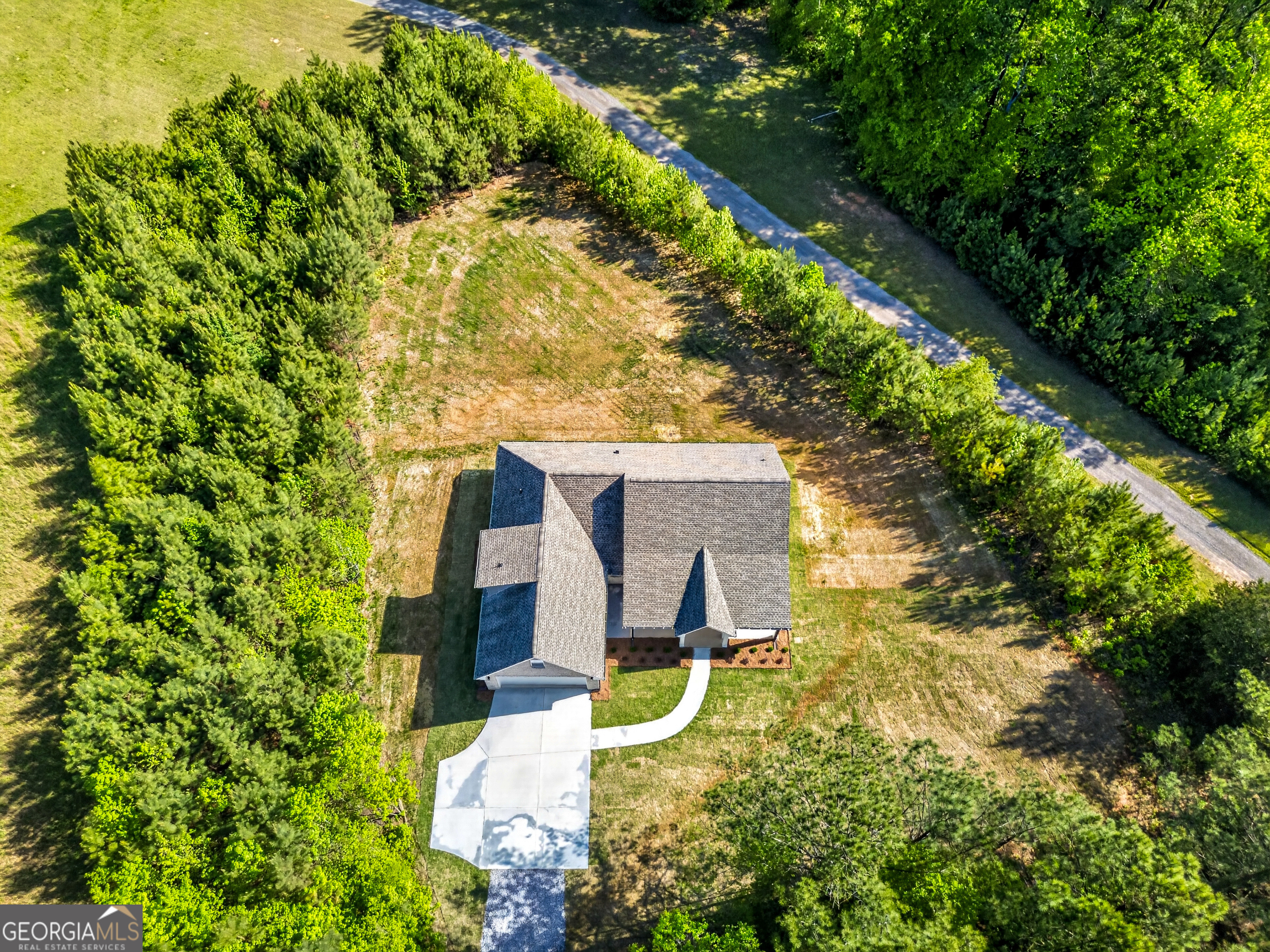1455 Laney Drive Locust Grove, GA 30248 - Photo 34 of 37 an aerial view of residential house with outdoor space