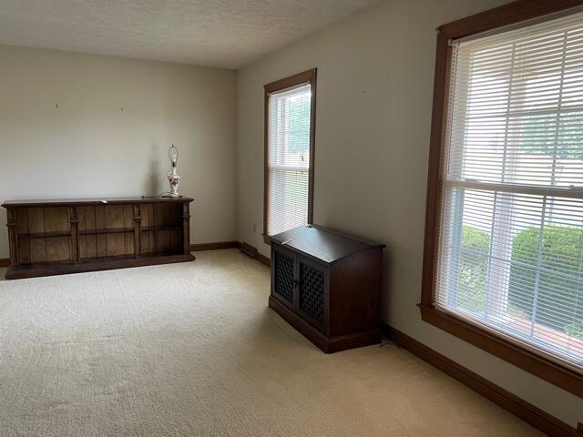 78 Robertson Ridge Road Axton, VA 24054 - Photo 2 of 22 a room with a bed and a window