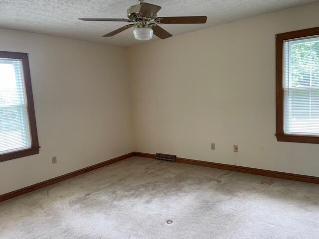 78 Robertson Ridge Road Axton, VA 24054 - Photo 13 of 22 an empty room with a window