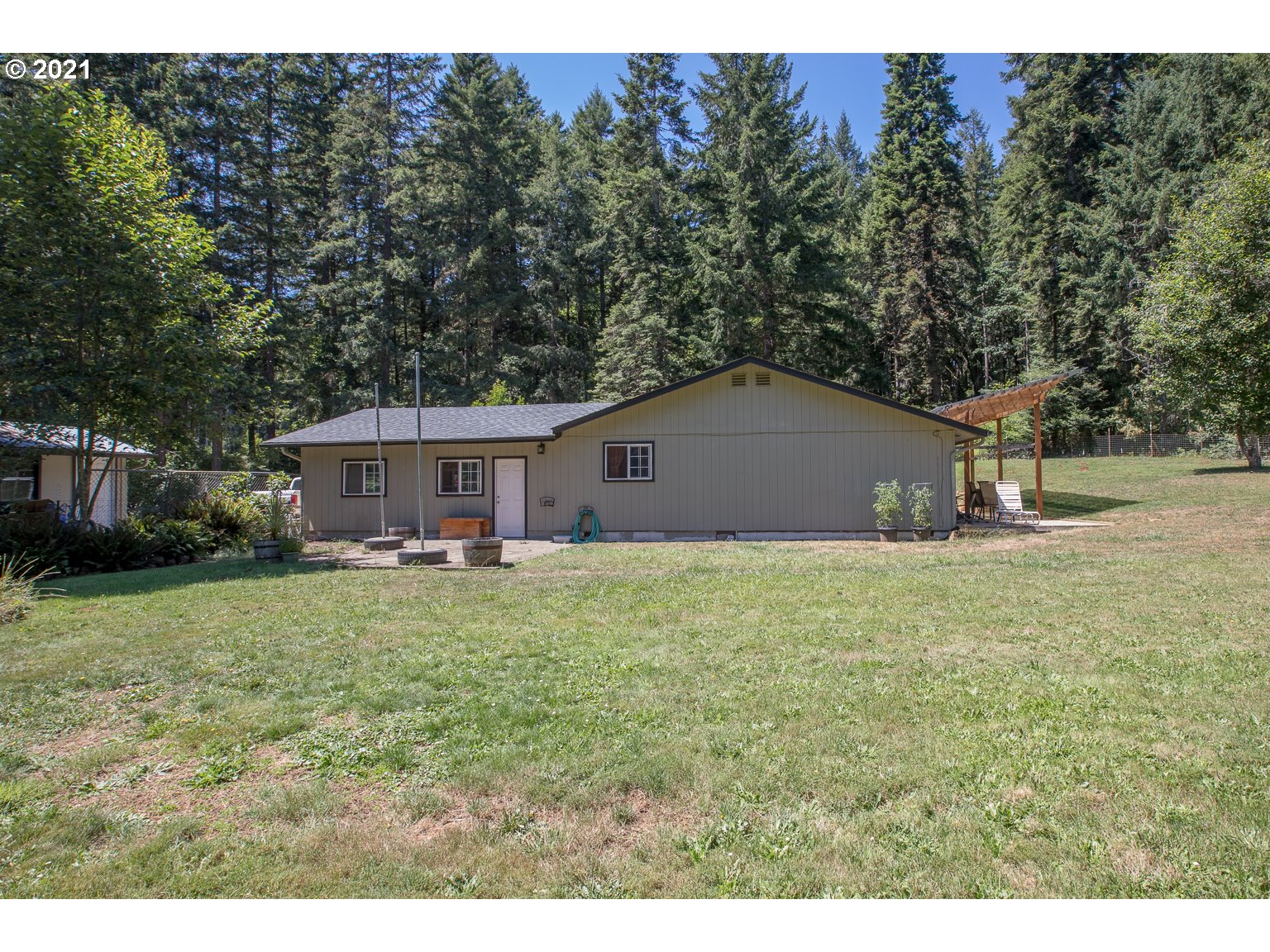 90361 Baker Road Elmira, OR 97437 - Photo 2 of 26 a fire hydrant in the middle of a field