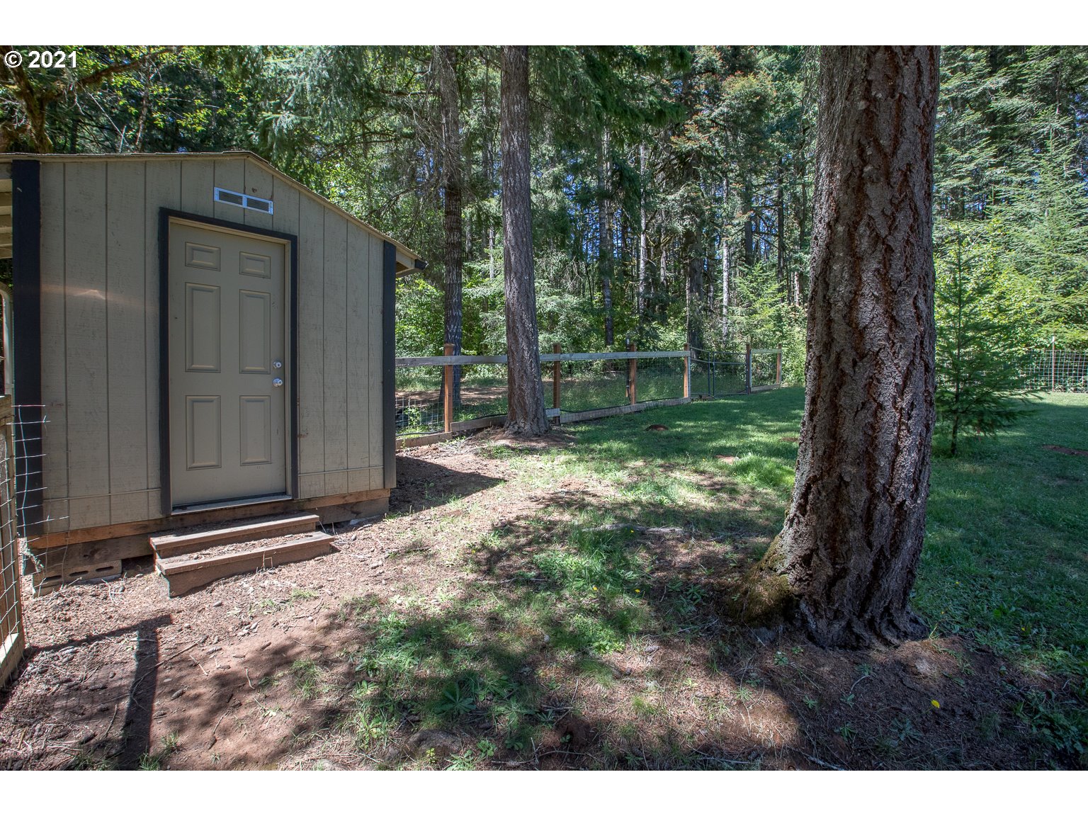 90361 Baker Road Elmira, OR 97437 - Photo 25 of 26 a backyard of a house with lots of green space