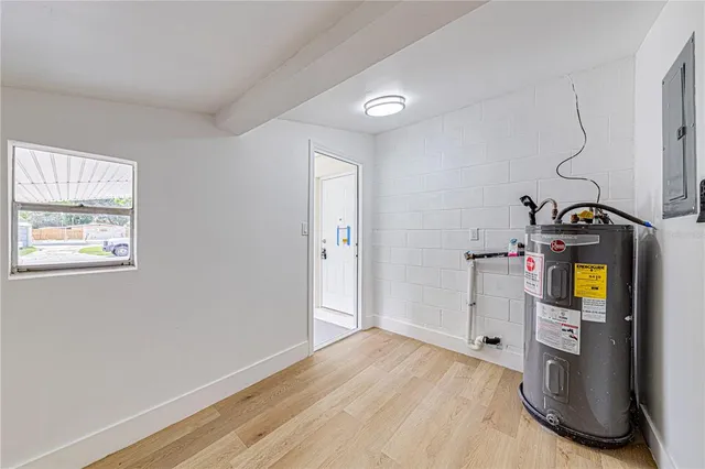a view of a kitchen from the hallway