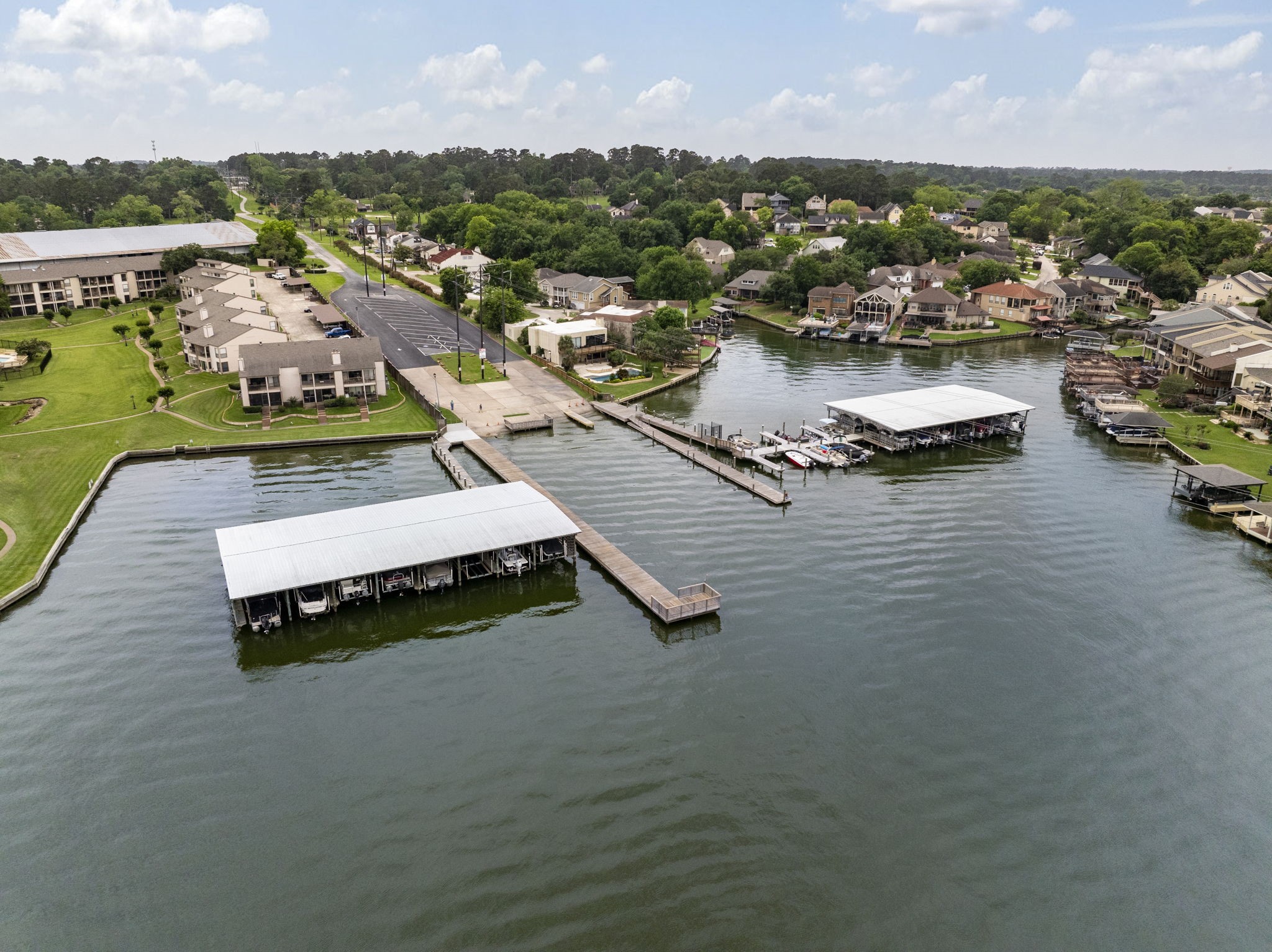 49 April Village Conroe, TX 77356 - Photo 36 of 46 an aerial view of a houses with a lake view