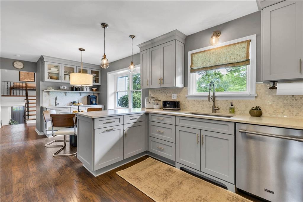 139 Laurel Drive Beaver, PA 15009 - Photo 11 of 46 a kitchen with white cabinets and white appliances