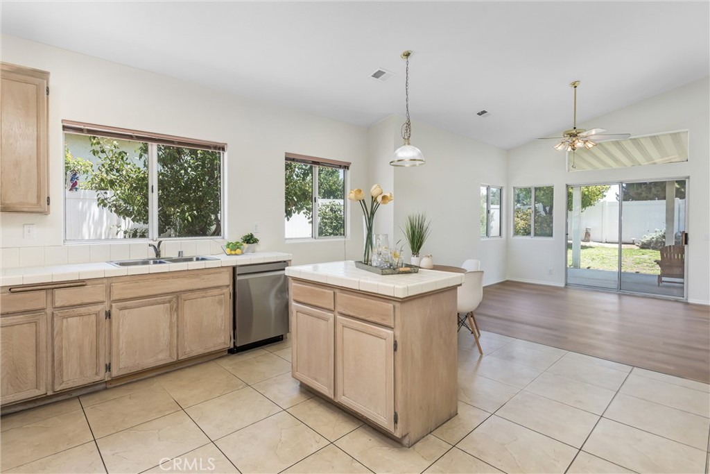 8742 Feathertop Road Riverside, CA 92508 - Photo 15 of 40 The kitchen adjacent to the family room and the backyard deck & backyard lot!