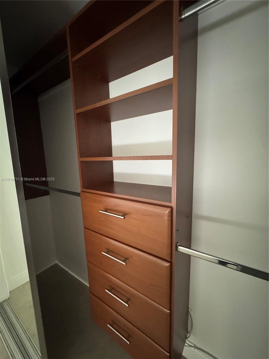 5839 Southwest 74th Terrace, Unit 104 South Miami, FL 33143 - Photo 12 of 25 a close view of closet