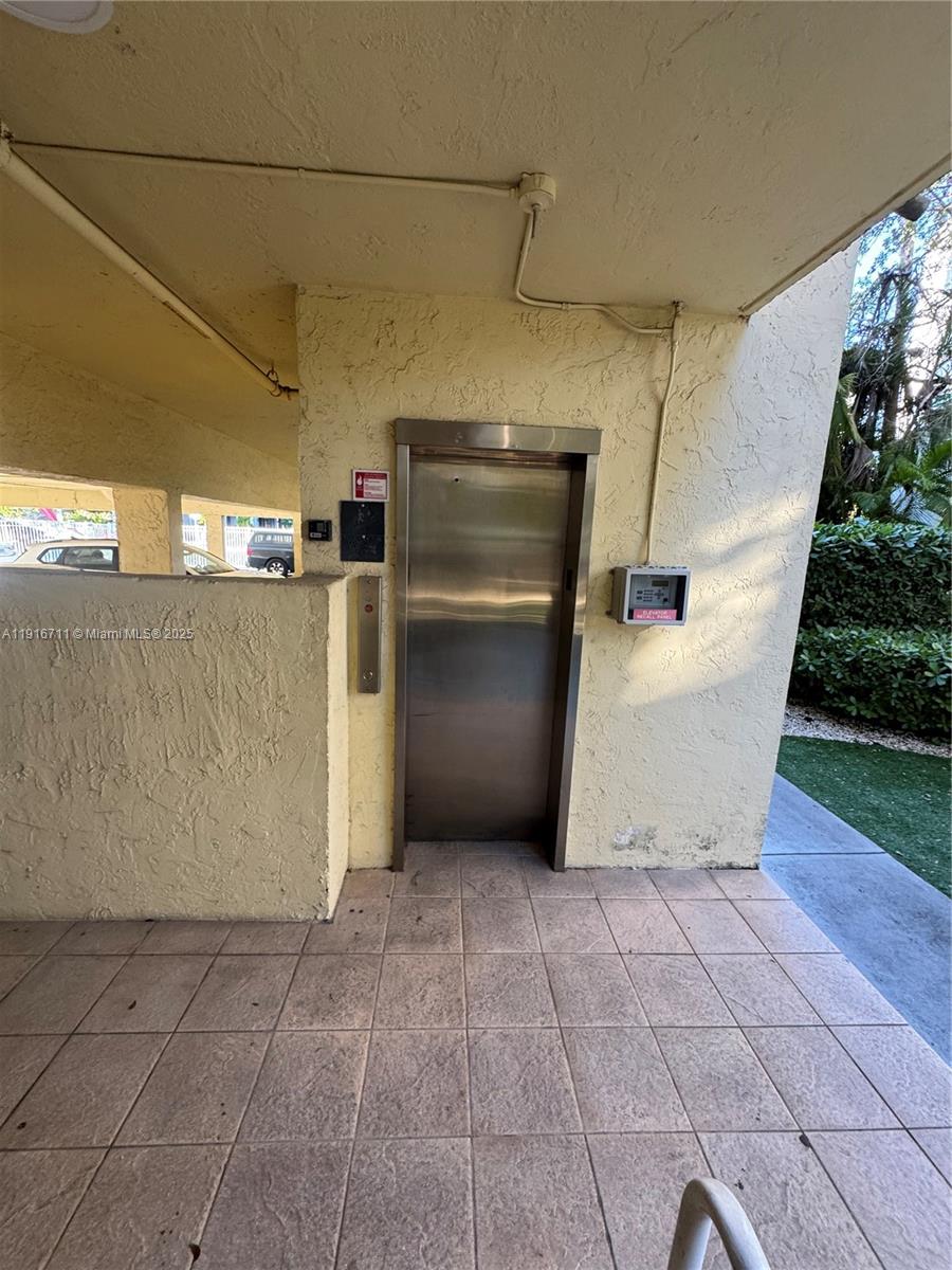 5839 Southwest 74th Terrace, Unit 104 South Miami, FL 33143 - Photo 19 of 25 a view of a garage