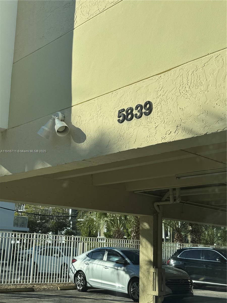5839 Southwest 74th Terrace, Unit 104 South Miami, FL 33143 - Photo 24 of 25 a view of parking area