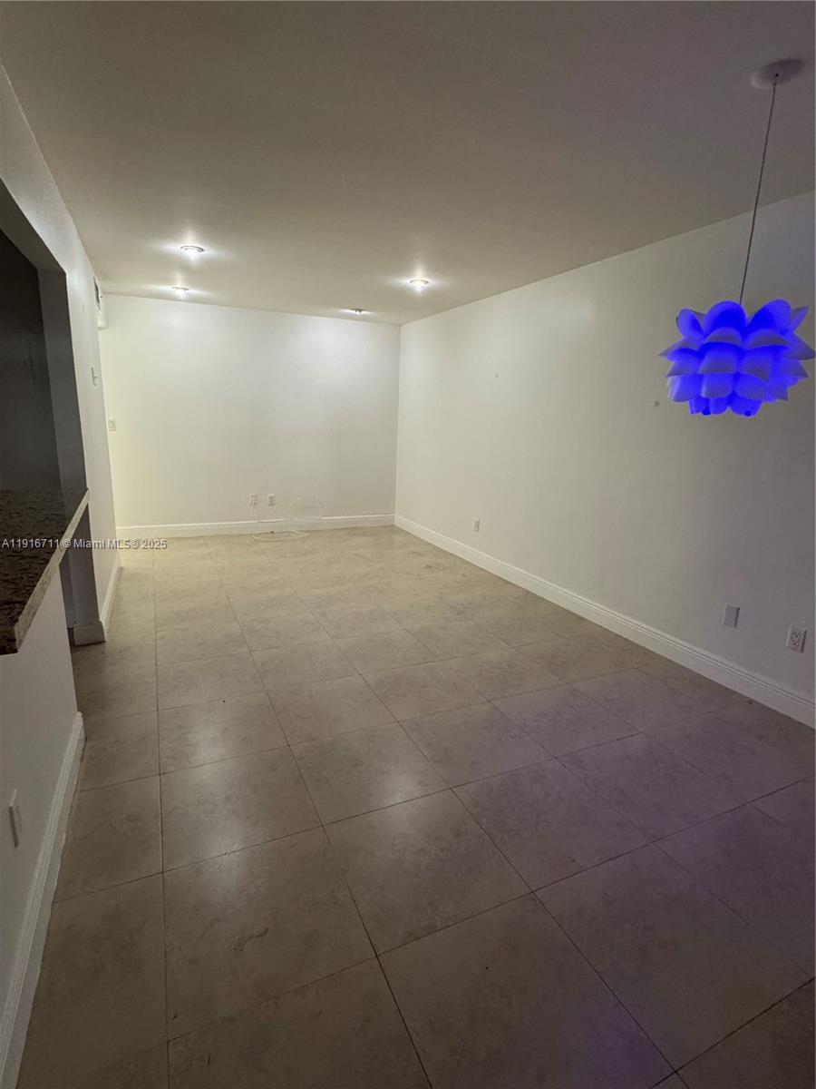 5839 Southwest 74th Terrace, Unit 104 South Miami, FL 33143 - Photo 5 of 25 a view of empty room