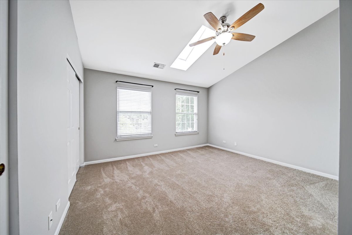 351 Fallbrook Court Schaumburg, IL 60107 - Photo 11 of 29 a view of an empty room with a window