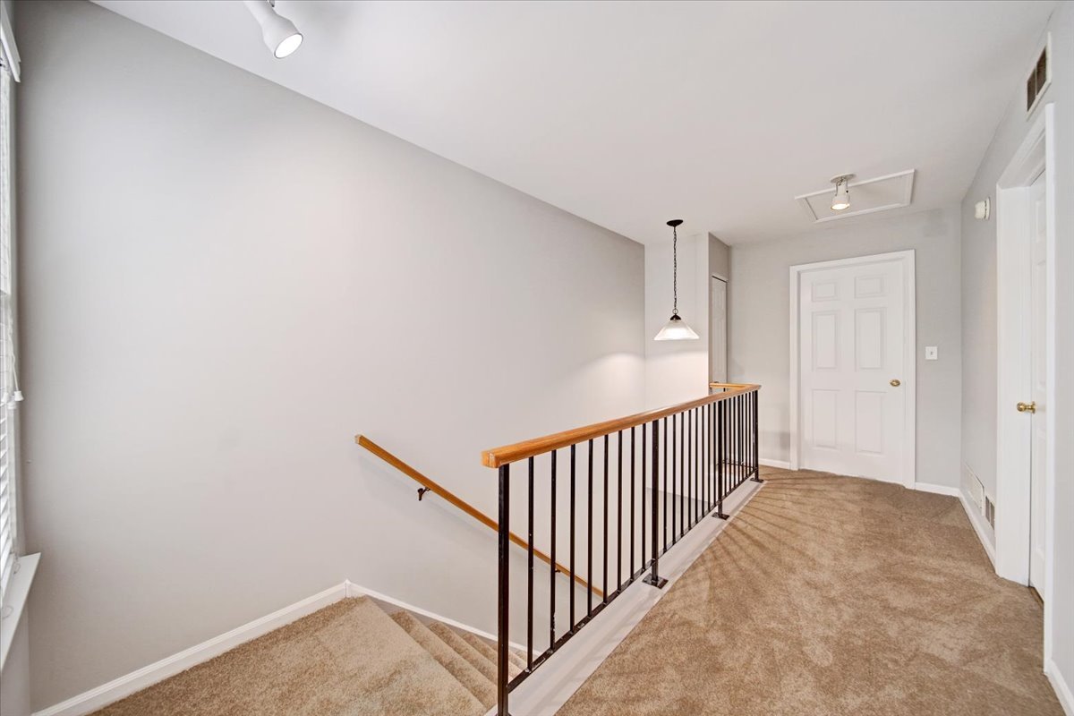 351 Fallbrook Court Schaumburg, IL 60107 - Photo 17 of 29 a view of a hallway with closet area