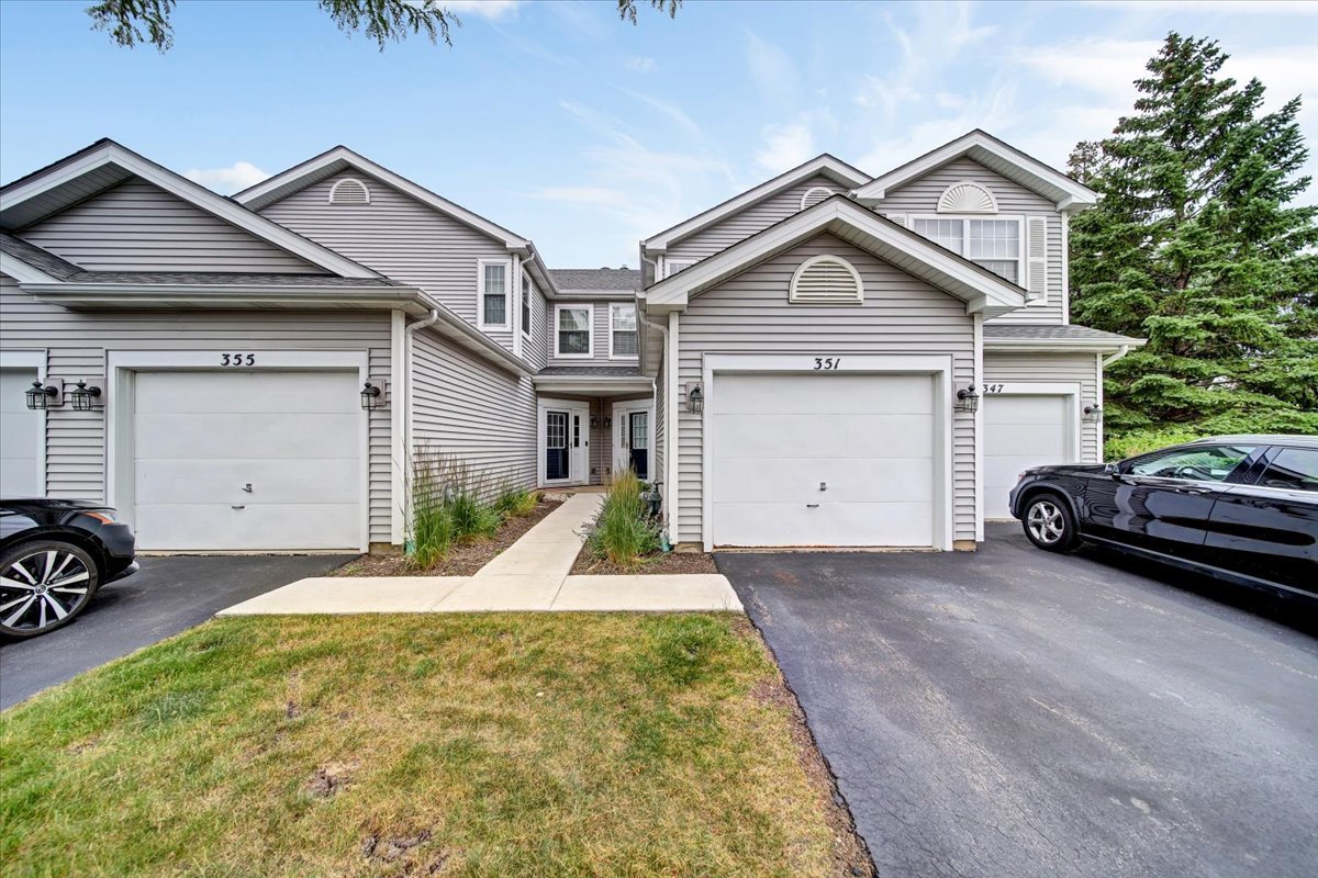 351 Fallbrook Court Schaumburg, IL 60107 - Photo 2 of 29 a view of a car parked in front of house