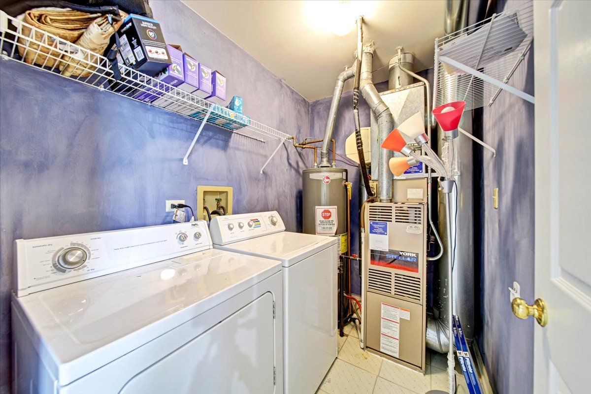 351 Fallbrook Court Schaumburg, IL 60107 - Photo 26 of 29 a utility room with dryer and washer