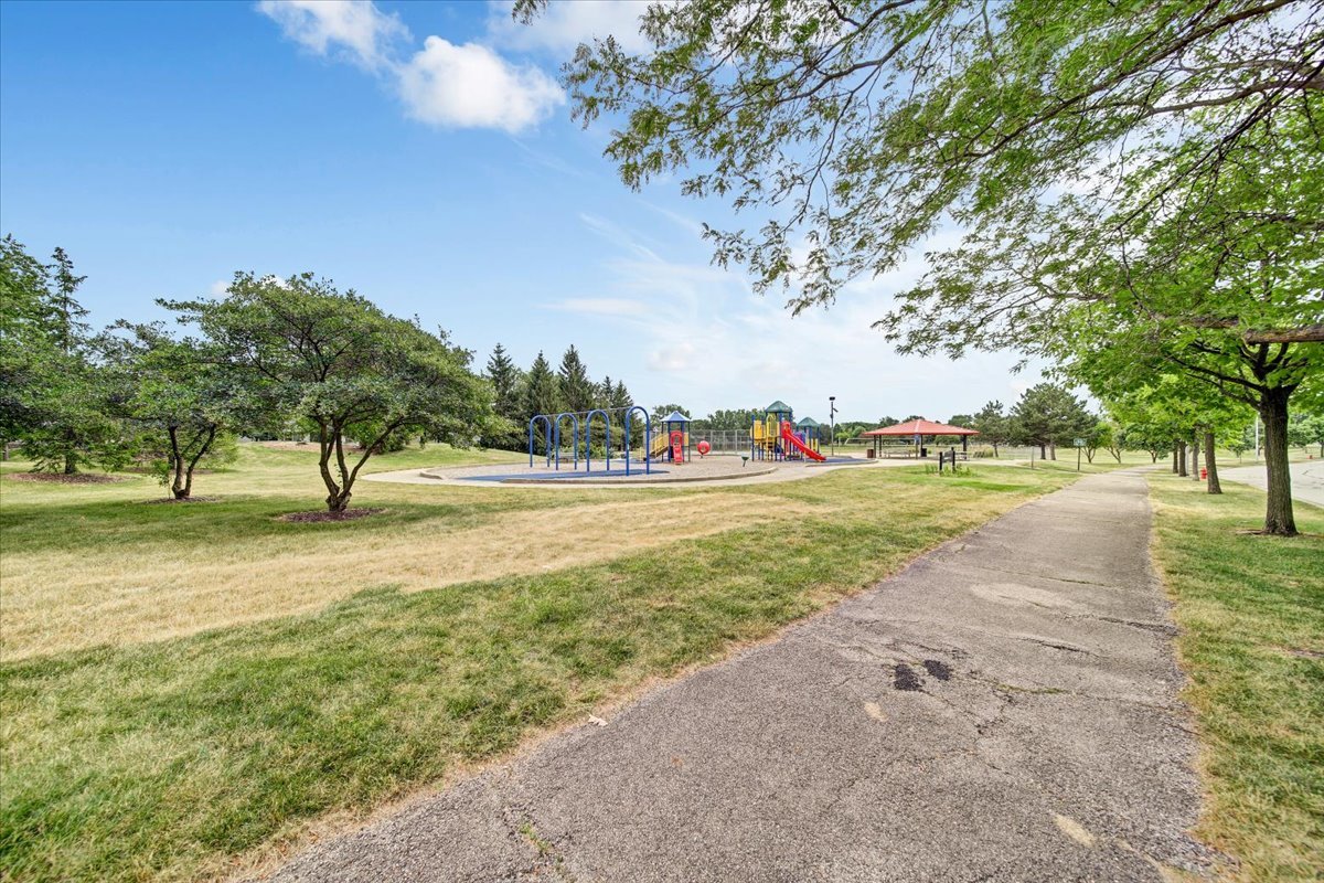 351 Fallbrook Court Schaumburg, IL 60107 - Photo 29 of 29 a view of outdoor space with garden and trees