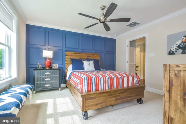 a living room with furniture rug and window