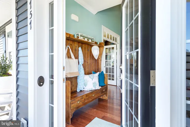 a view of entryway with wooden floor