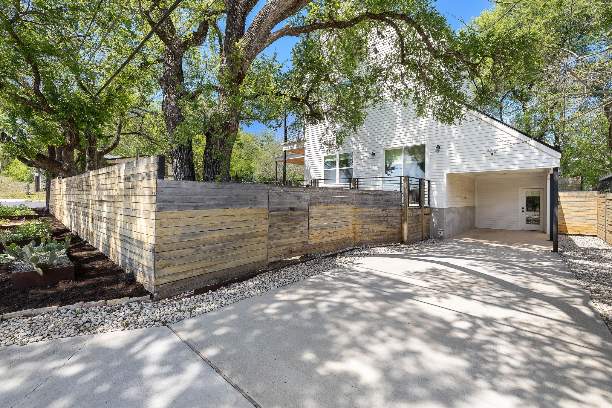 1201 Luna Street Austin, TX 78721 - Photo 27 of 31 a view of a house with a tree