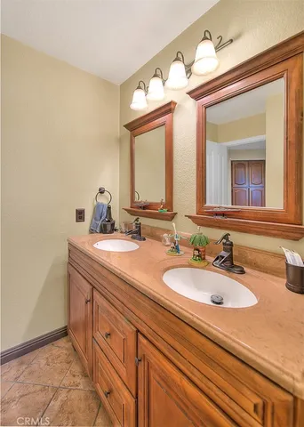a bathroom with a shower and a mirror