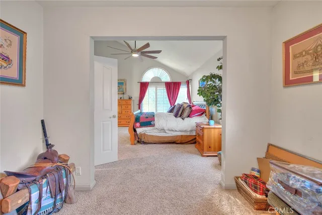 a bathroom with a tub double vanity sink and a mirror