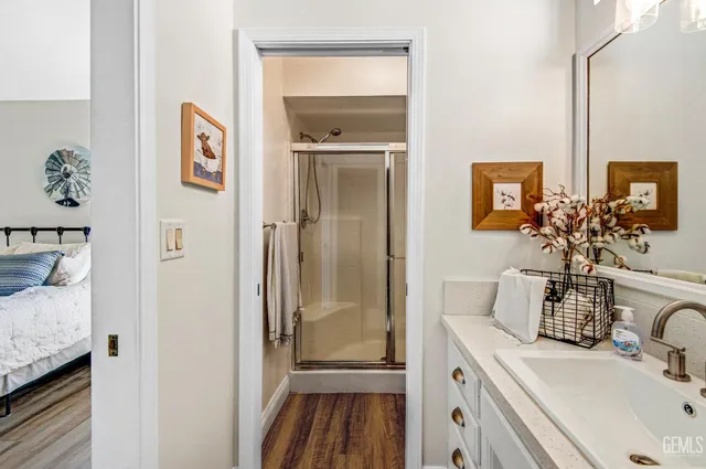 a bathroom with a sink and a mirror