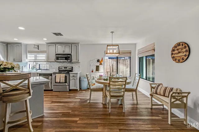 a view of a dining room with furniture