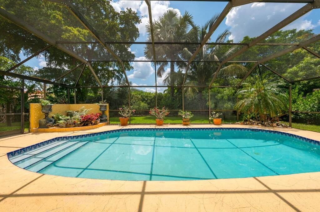 21493 Woodchuck Way Boca Raton, FL 33428 - Photo 2 of 16 02-Oversized saltwater pool