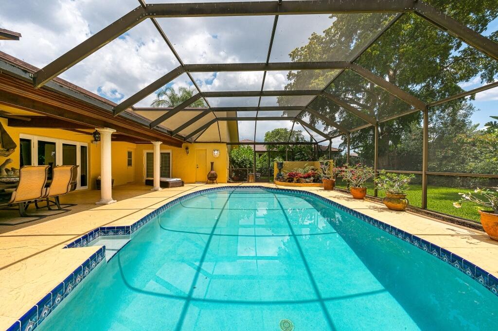 21493 Woodchuck Way Boca Raton, FL 33428 - Photo 3 of 16 03-Large patio and backyard