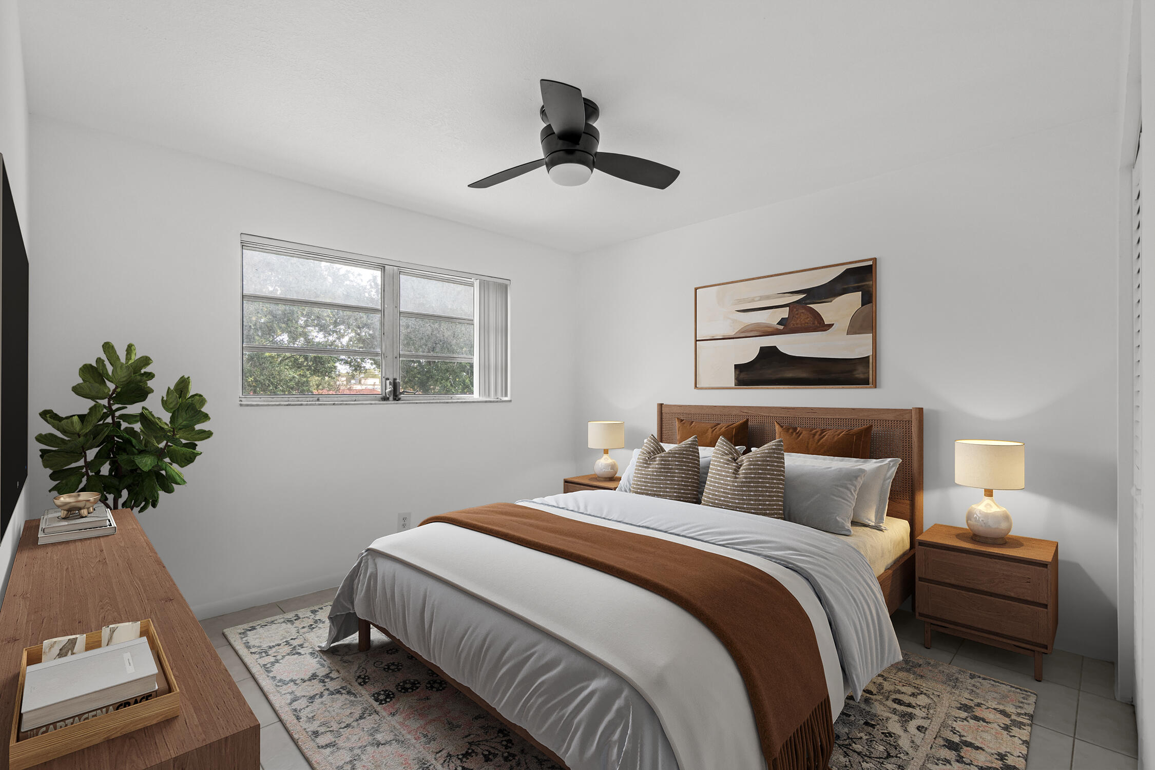 a bedroom with bed and a window