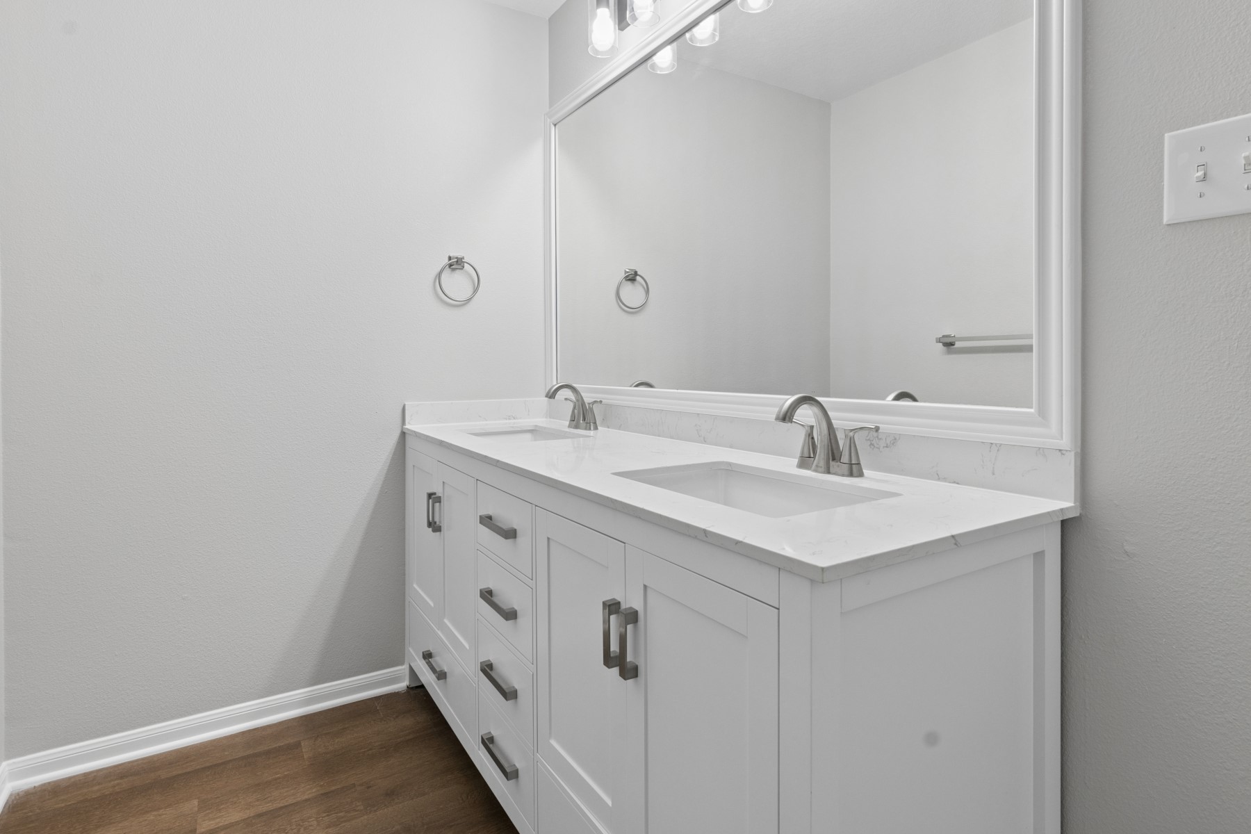 7811 Adonis Avenue Baytown, TX 77521 - Photo 26 of 36 a bathroom with a sink and a mirror